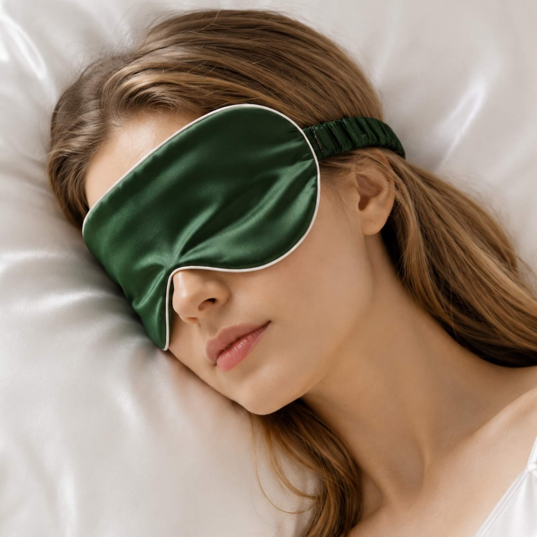 Antifaz de seda para dormir con banda elástica envuelta en seda.